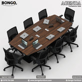 A conference room setting featuring the Agenda Conference Table with a dark Water Resistant Strong Laminated Board finish, accompanied by black office chairs and laptops on the table.