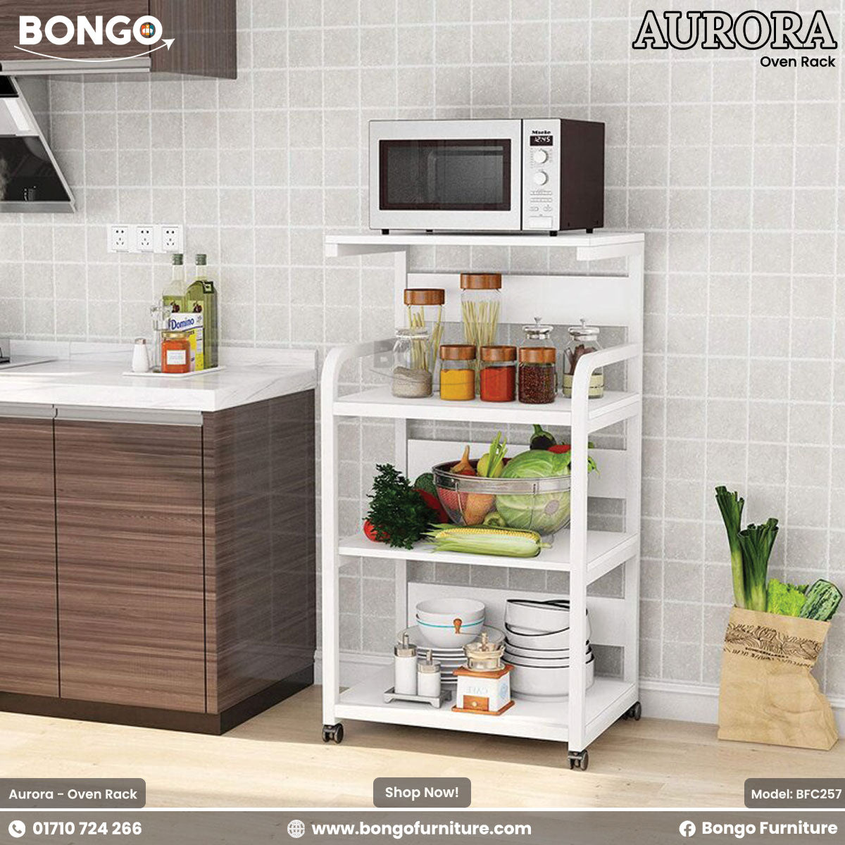 A white Aurora oven rack with multiple shelves, placed in a kitchen setting with a microwave on top and various kitchen items around it.