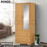 A Beach heritage cupboard with a mirrored section, model BFC002, placed in a living room setting.