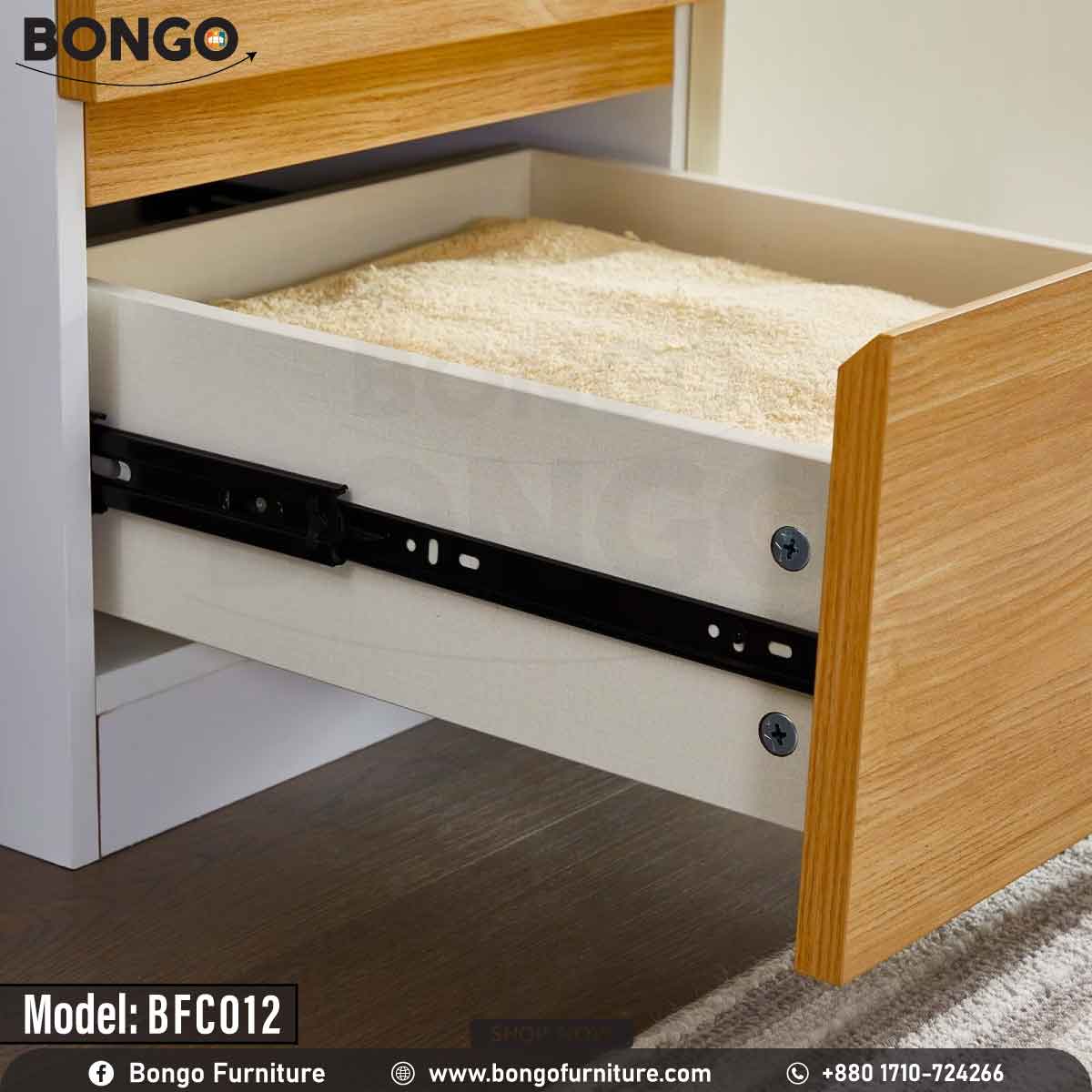 A white Butterfly Cupboard with Water Resistant Strong Laminated Board elements, featuring a closed door and multiple drawers, placed in a room with a potted plant to the side.