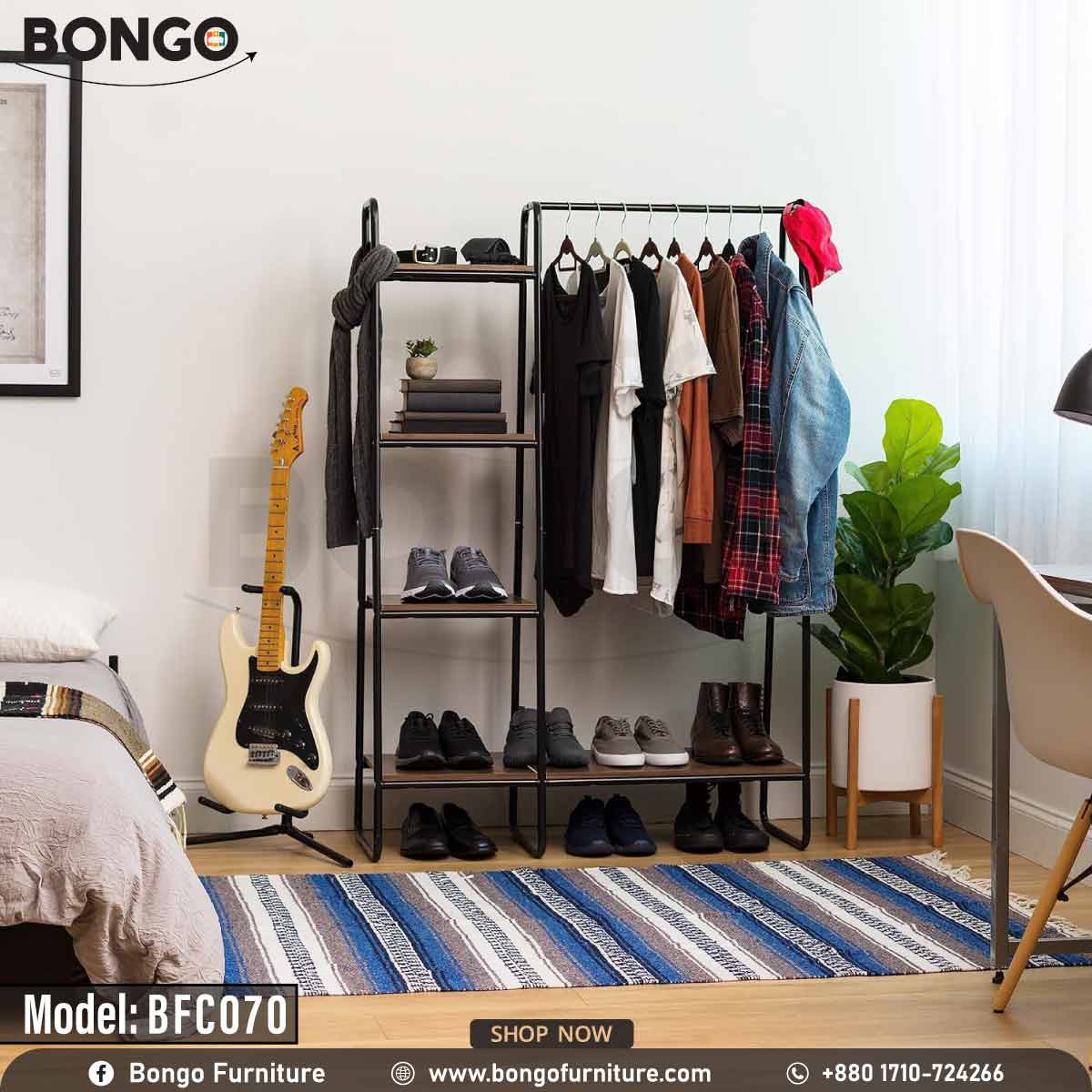 An industrial-style open garment rack from BONGO, featuring a black metal frame and dark wood-grain shelves. The unit has a wide section with a hanging rod on the right and a narrow five-tier shelving tower on the left. The rack is shown in a bedroom, fully stocked with clothes, shoes, and a scarf.