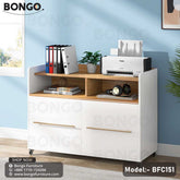 A white laminated drawer unit with multiple drawers, a printer, and various office supplies on the desk top, set against a blue wall in a room with natural lighting.