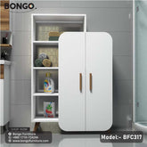 A white mysterious bookshelf (model BFC317) with two doors, placed in a bathroom setting, with various items on the shelves.