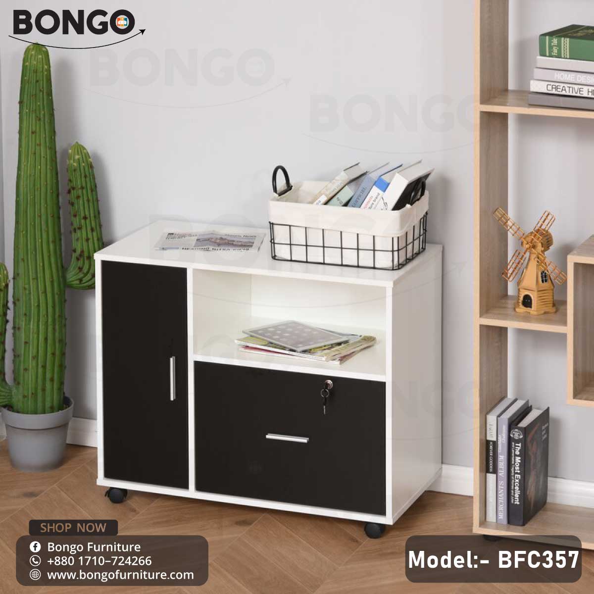 A black and white stepped mobile file cabinet with a lock and wheels, placed in a home setting with books and a cactus decor.