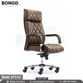 A brown, high-back director chair with a diamond pattern on the backrest, equipped with an adjustable height mechanism, gas lift, and a chrome base with 360-degree nylon wheels.