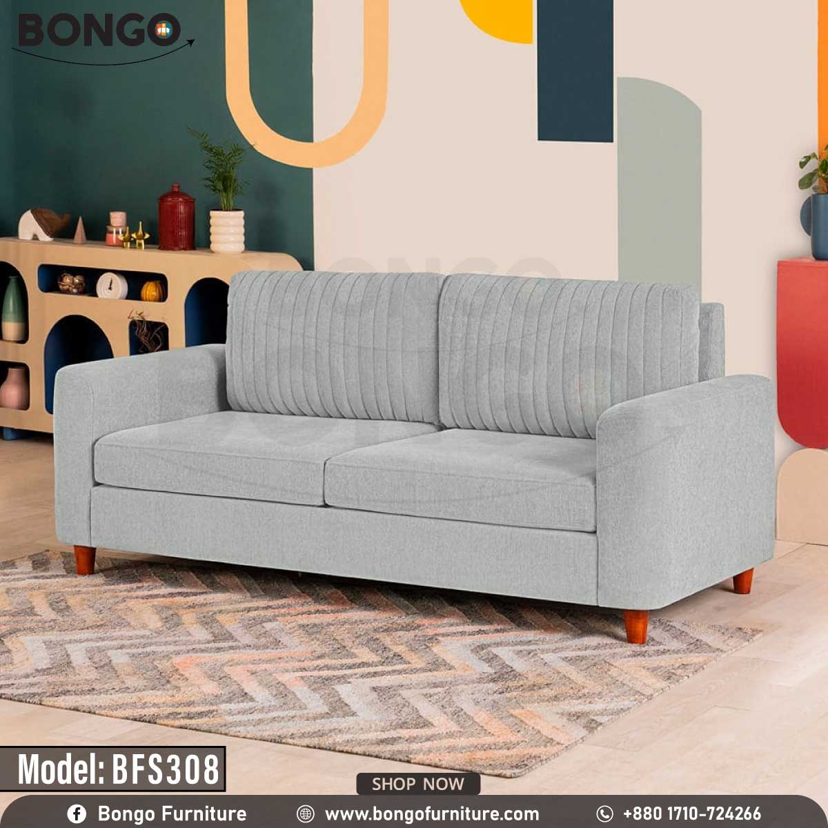 A Ash upholstered sofa with wooden legs, positioned in a room with colorful wall art and decor.