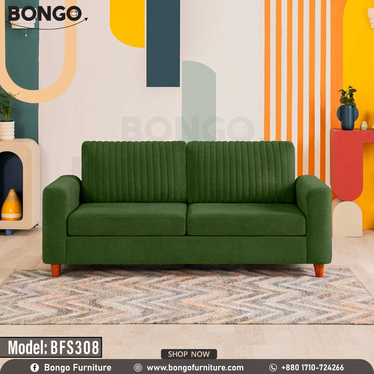 A Green upholstered sofa with wooden legs, positioned in a room with colorful wall art and decor.