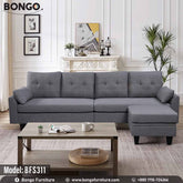 A Navy Blue 'Harriet Family Sofa' with a built-in espresso finish Metal legs, positioned in a well-decorated living room setting.