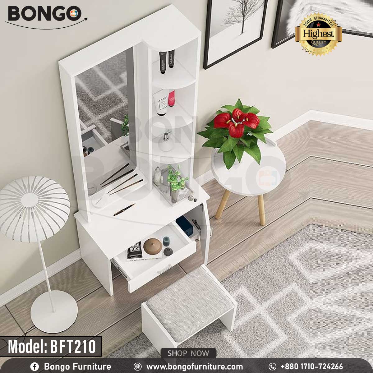 A white polished dressing table with a mirror, model BFT210, displayed in a room setting with decorative items and a plant beside it.