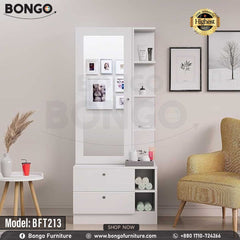 A promotional image of a modern white dressing table from BONGO. The unit features a large mirror next to a narrow tower of shelves. The base contains two large drawers and open storage cubbies. The dressing table is shown styled with photos and cosmetics in a bedroom setting. A "Highest Quality" seal is displayed in the corner. A promotional image of a modern white dressing table from BONGO. The unit features a large mirror next to a narrow tower of shelves. The base contains two large drawers and open storage cubbies. The dressing table is shown styled with photos and cosmetics in a bedroom setting. A "Highest Quality" seal is displayed in the corner.