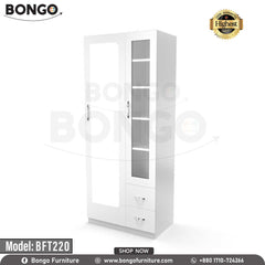 A white dressing table with a mirror, drawers, and hydraulics hinges, placed in a room with a potted plant and a framed picture on the wall. A white dressing table with a mirror, drawers, and hydraulics hinges, placed in a room with a potted plant and a framed picture on the wall.