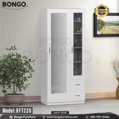 A white dressing table with a mirror, drawers, and hydraulics hinges, placed in a room with a potted plant and a framed picture on the wall. A white dressing table with a mirror, drawers, and hydraulics hinges, placed in a room with a potted plant and a framed picture on the wall.