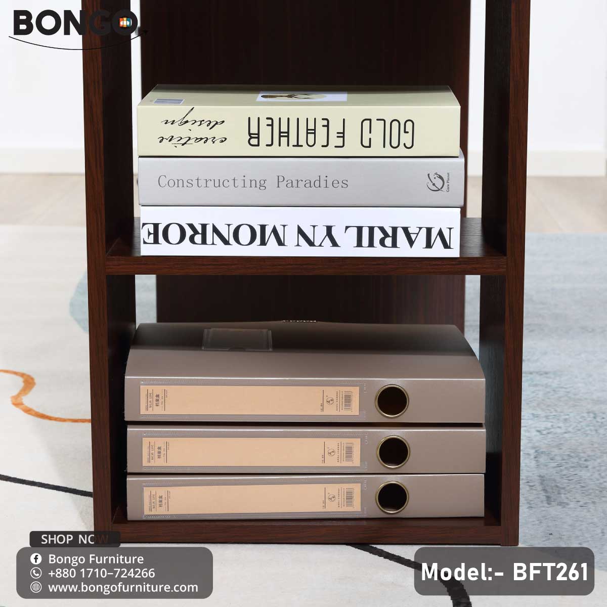 A brown Qube Reading Table - BFT261 desk with a laptop, a notebook, a coffee cup, and some books on it, placed in a room with soft lighting and a blurred background.