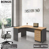 An L-shaped executive desk with a gray tabletop and a wood drawer unit, branded by BONGO, with office chairs and decorative plants in the background.