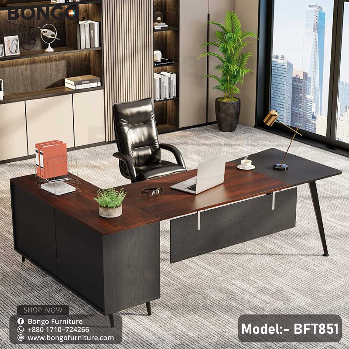 A Dynasty Boss Table model BFT851 with a black steel frame and a brown laminated tabletop, featuring a desk setup with office chairs and decorative plants in the background.