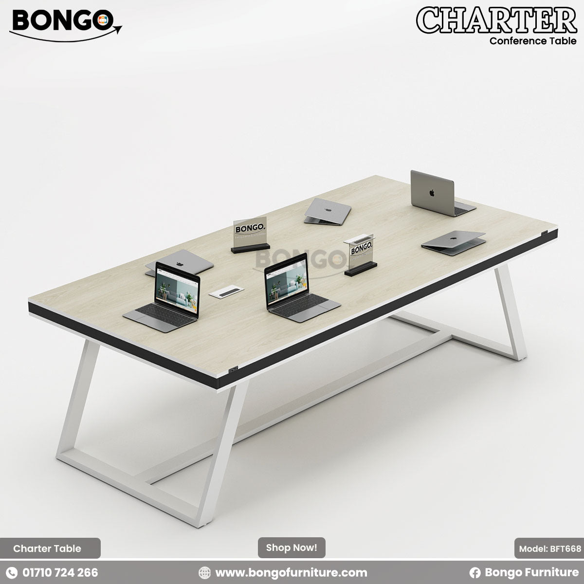 A rectangular black conference table with a steel base, surrounded by black office chairs with wheels. The table has a white rectangular name plate on each side.