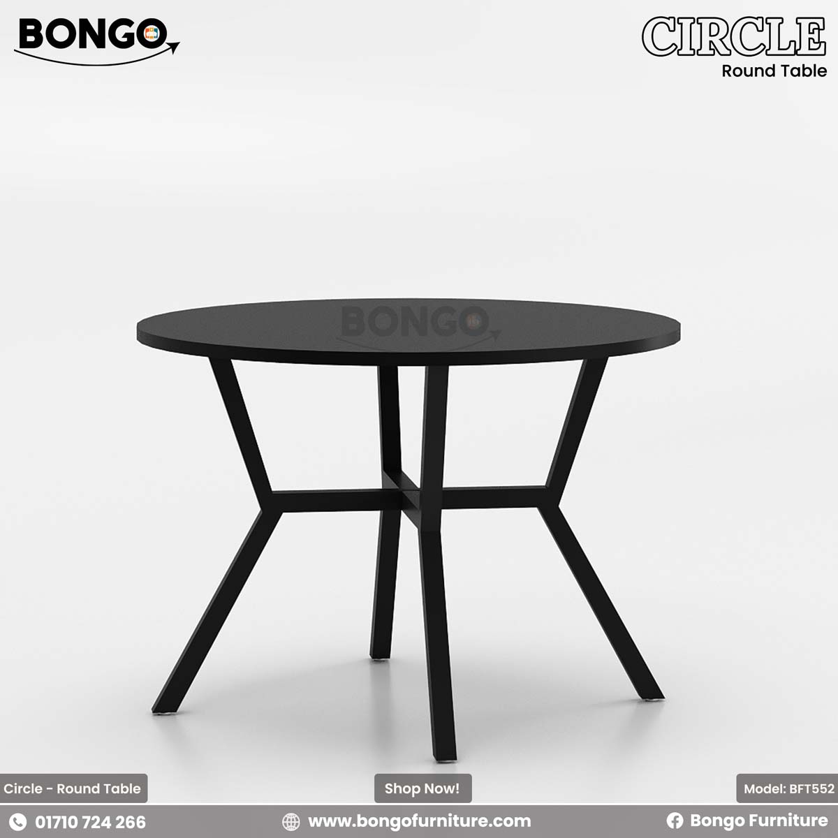 A round dining table with a beige laminated surface and a dark steel base, placed in a room with a view of buildings through the window.
