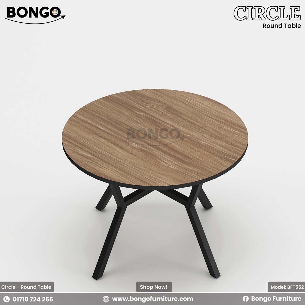 A round dining table with a beige laminated surface and a dark steel base, placed in a room with a view of buildings through the window.
