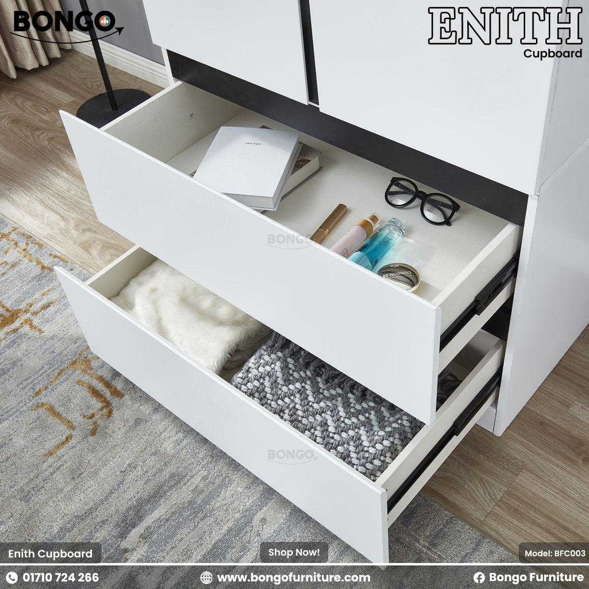 White cupboard with open drawers containing various items on a wooden floor.