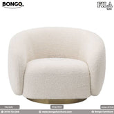 A beige Fila sofa with a modern design, featuring plush foam and a round footstool, displayed against a white background.