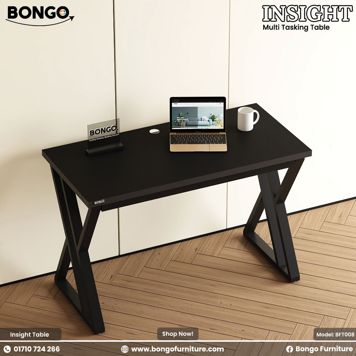 Black multi-tasking table with a laptop and mug on a wooden floor, featuring Bongo Furniture branding.