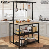 A kitchen island table named Juno with a steel frame and Water Resistant Strong Laminated Board tabletop, equipped with shelves and hanging utensils.