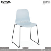 A modern side chair featuring a one-piece molded shell in a pale blue color with a subtle embossed geometric pattern. The chair is supported by a minimalist, black metal sled base.