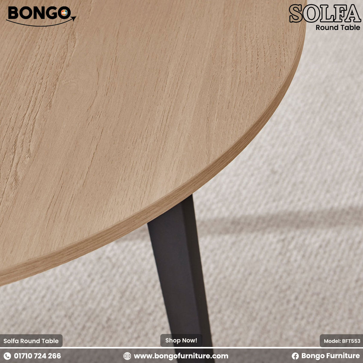 A round dining table with black legs and a beige laminated board top, branded by Bongo Furniture, with a vase and bowl placed on top.