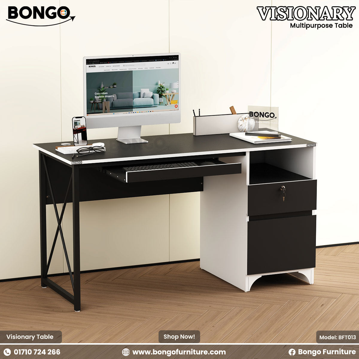 A black and white Visionary Multi Tasking Table with a computer monitor, keyboard, and a notebook on it, set against a white background.