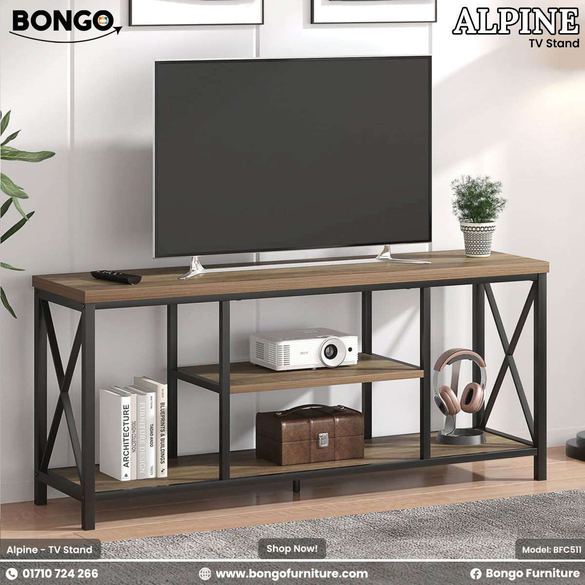 TV stand with a television, books, and other items on a white wall background