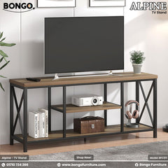 TV stand with a television, books, and other items on a white wall background