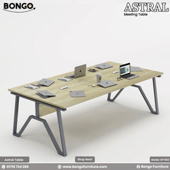 Bongo Astral meeting table with multiple laptops and devices on a white background