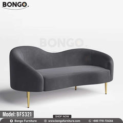 Victoria Sofa - A modern Victoria sofa with a white upholstery, model BFS321, with gold steel legs, placed in a bright room with a window and a potted plant in the background..