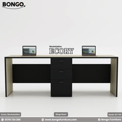 Black and white office workstation with two laptops on a white background.