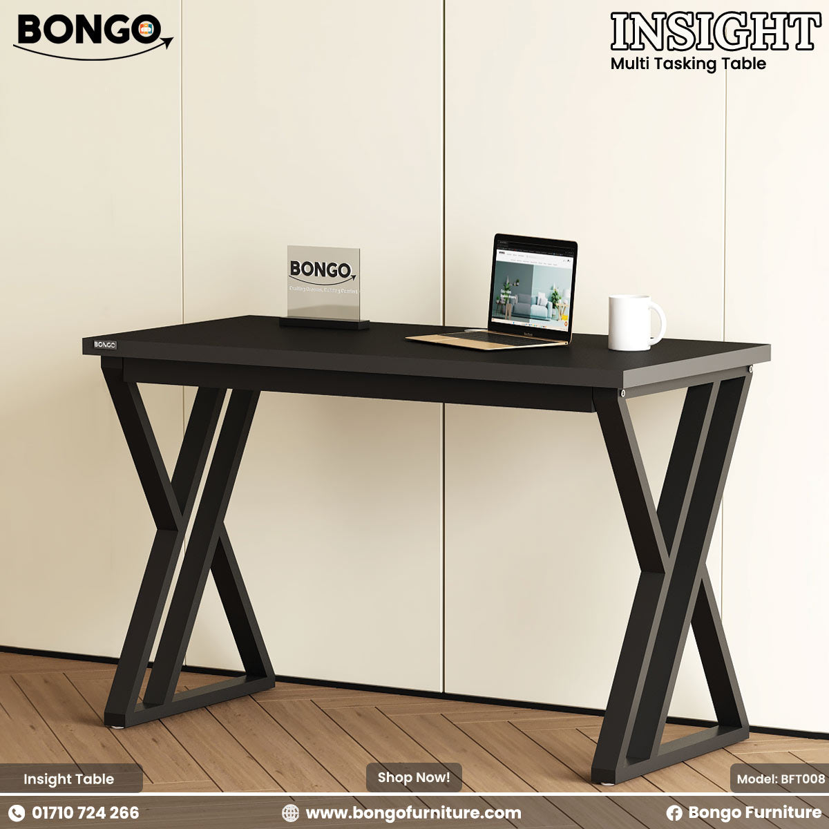 Black multi-tasking table with a laptop and mug on a wooden floor, featuring Bongo Furniture branding.