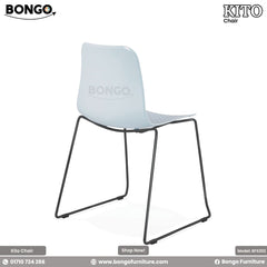 A modern side chair featuring a one-piece molded shell in a pale blue color with a subtle embossed geometric pattern. The chair is supported by a minimalist, black metal sled base.