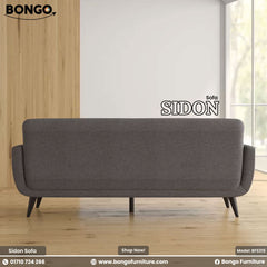 Gray sofa labeled 'SIDON' with Bongo Furniture branding in a modern room.