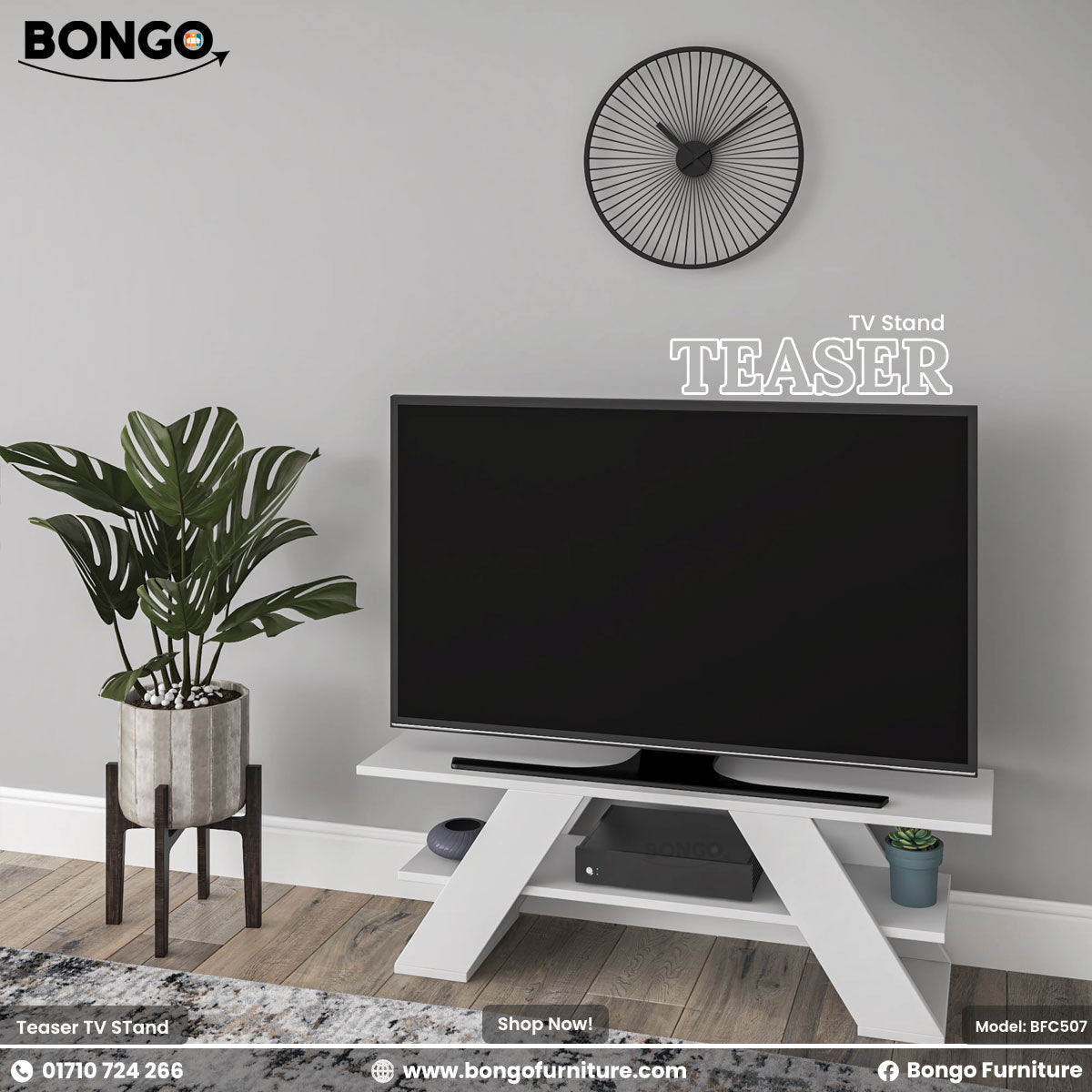 A promotional image of the "TEASER TV Stand" by Bongo, showcased in a modern living room setting. The TV stand is solid white and features a distinctive design with two wide, angled, A-frame style legs and a lower shelf. A large flat-screen television sits on top of the stand. To the left is a large potted plant in a grey pot on a dark wood stand, and on the light grey wall above is a black, minimalist, sunburst-style clock.