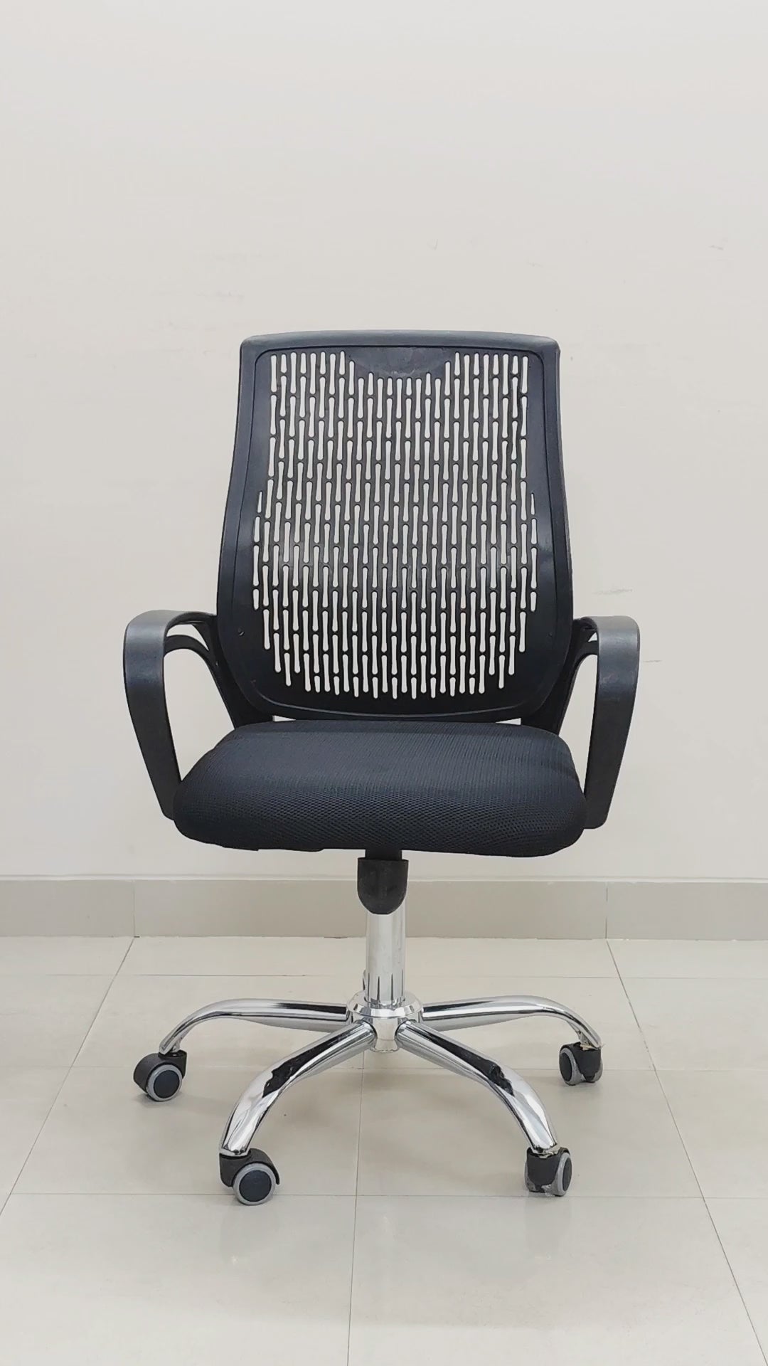 Bongo Furniture Impact Office Chair model BFS062 featuring a black patterned mesh back, chrome base, and ergonomic armrests.